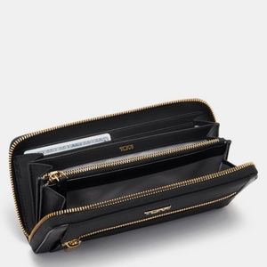TUMI VOYAGEUR Zip-Around Continental WALLET- slightly worn